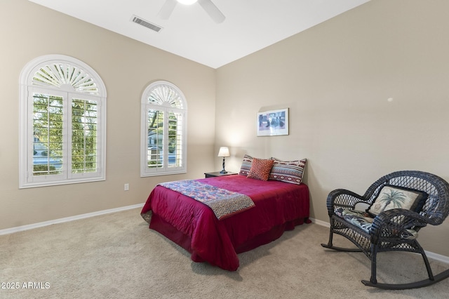 carpeted bedroom featuring ceiling fan and lofted ceiling