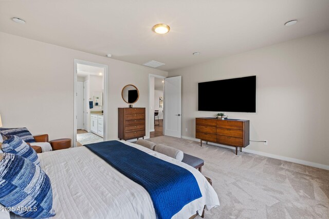 4947 N Mclaury Dr, Prescott Valley, AZ 86314 - bedroom with light carpet, baseboards, ensuite bathroom, and visible vents
