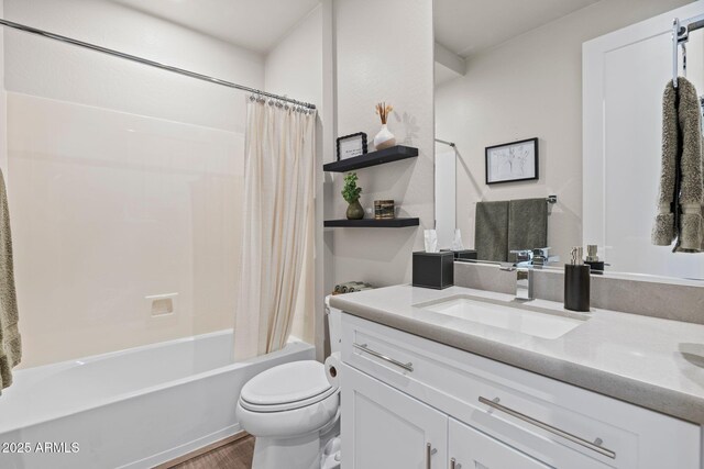 4947 N Mclaury Dr, Prescott Valley, AZ 86314 - full bath featuring shower / bath combination with curtain, wood finished floors, toilet, and vanity