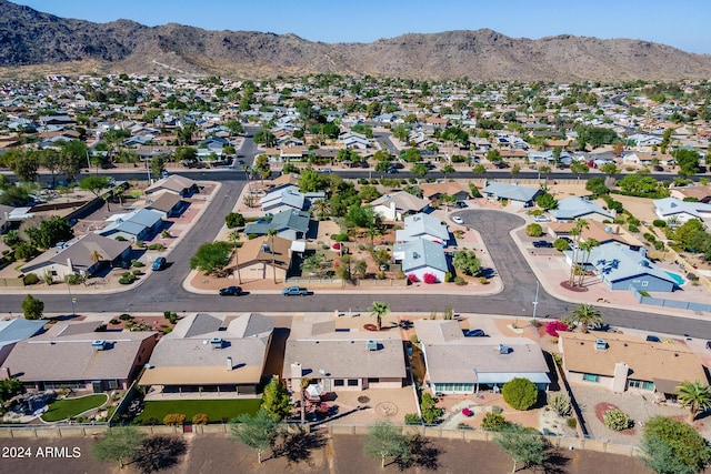 birds eye view of property featuring a residential view and a mountain view