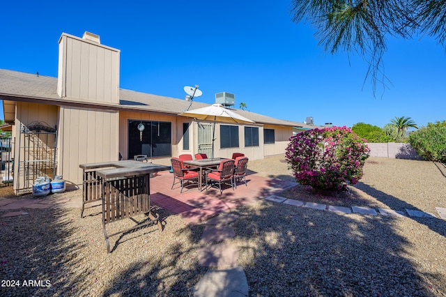 back of house featuring a patio