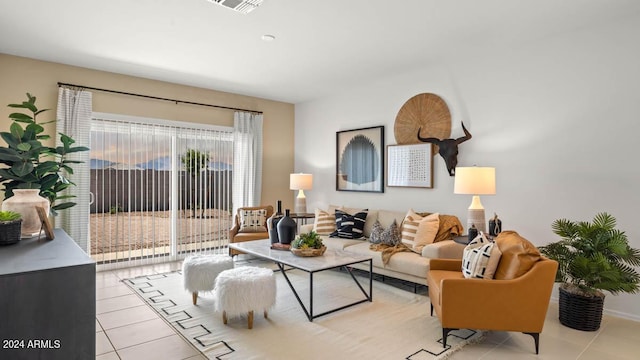 living room with light tile patterned flooring