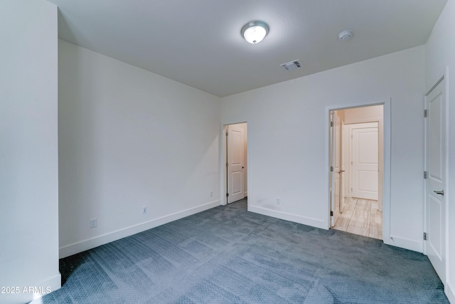 4927 S Tune, Mesa, AZ 85212 - unfurnished bedroom featuring carpet floors and baseboards