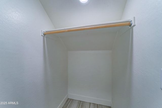 4927 S Tune, Mesa, AZ 85212 - walk in closet with light wood-style flooring