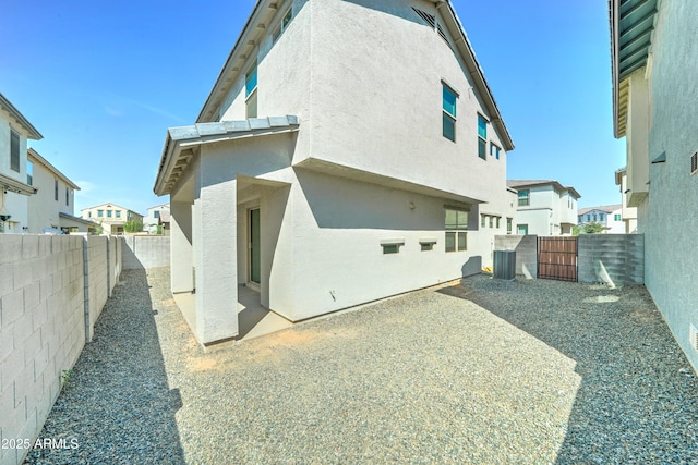 4927 S Tune, Mesa, AZ 85212 - rear view of property featuring stucco siding, a residential view, a fenced backyard, and a patio area