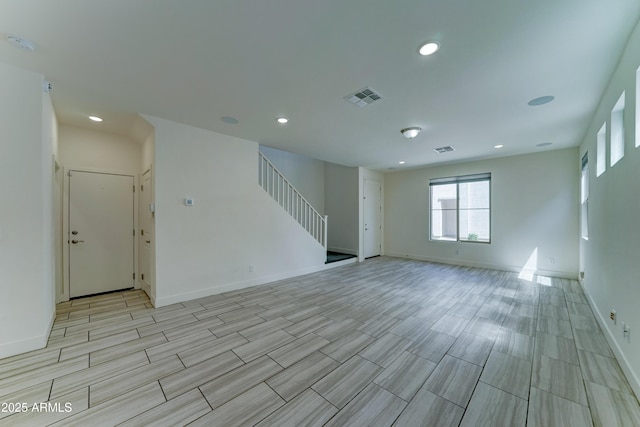 4927 S Tune, Mesa, AZ 85212 - unfurnished room featuring stairs, recessed lighting, wood tiled floors, and a smoke detector