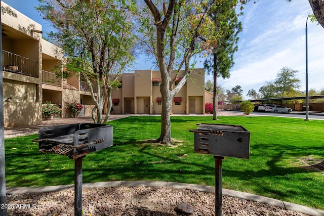 exterior space with a yard