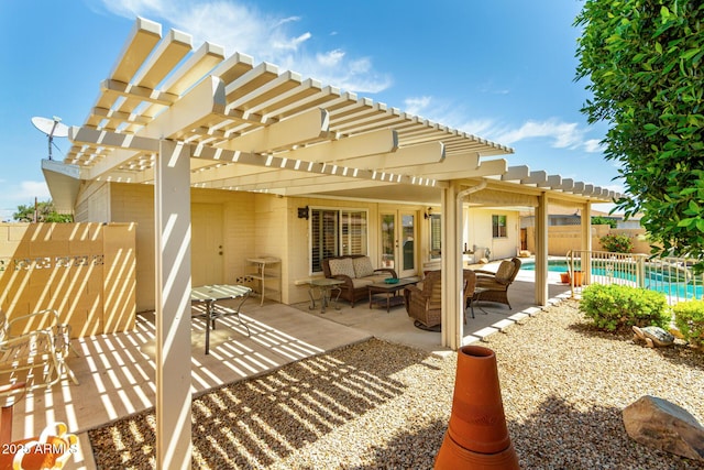 view of patio / terrace featuring a pergola, fence, outdoor lounge area, and a fenced in pool