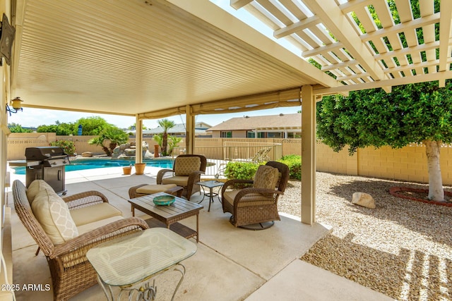 view of patio with a fenced in pool, a fenced backyard, an outdoor living space, and area for grilling