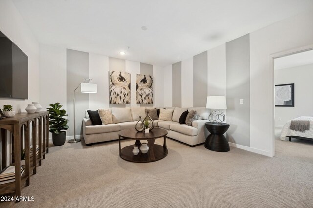 living room featuring light carpet