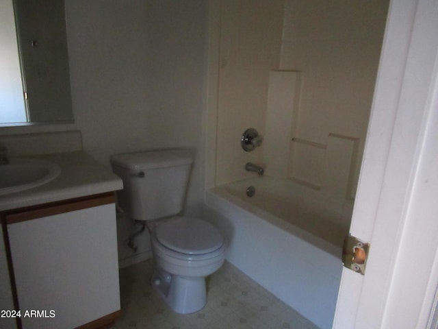 full bathroom featuring bathing tub / shower combination, vanity, and toilet