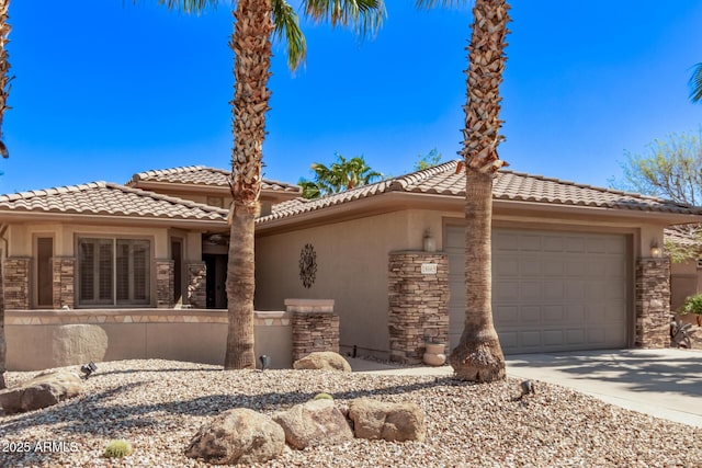 view of front of house featuring stucco siding, stone siding, concrete driveway, and an attached garage