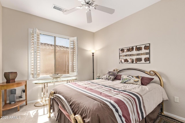 bedroom featuring ceiling fan, carpet, visible vents, and baseboards