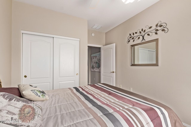 bedroom with a closet and ceiling fan