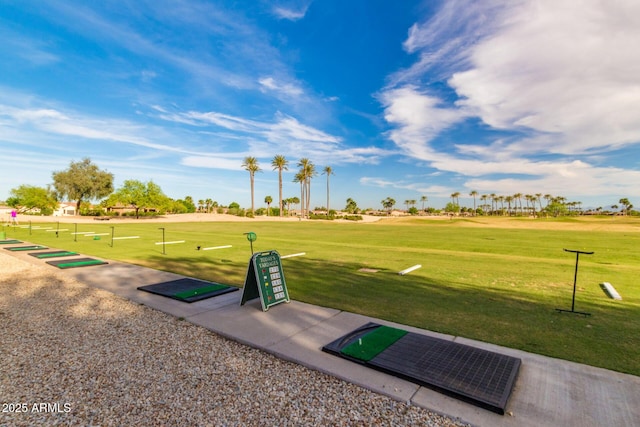 view of property's community featuring a lawn