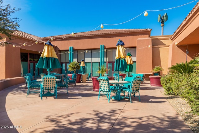 view of patio with outdoor dining space