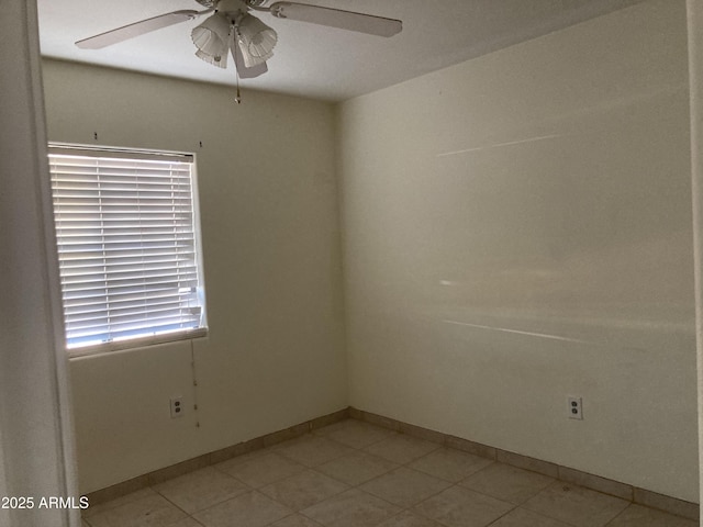 spare room featuring ceiling fan