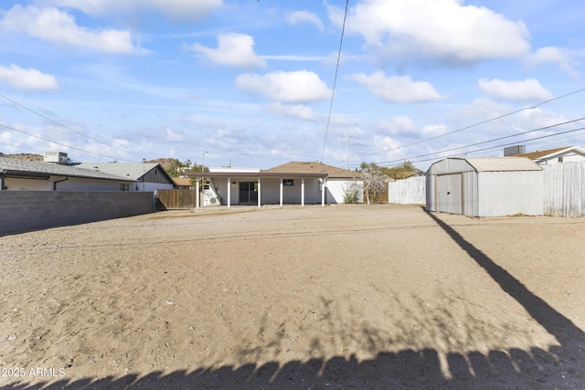 exterior space featuring a shed