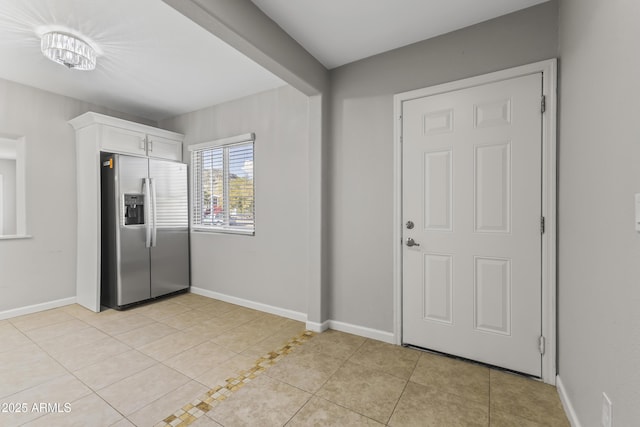 view of tiled foyer entrance