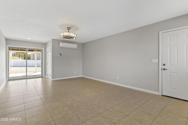 tiled spare room with a wall mounted AC