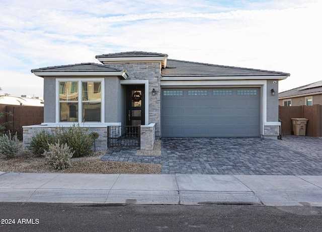 prairie-style home with a garage