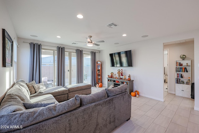 living room featuring ceiling fan