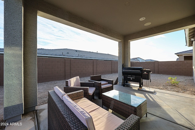 view of patio / terrace featuring an outdoor living space and grilling area