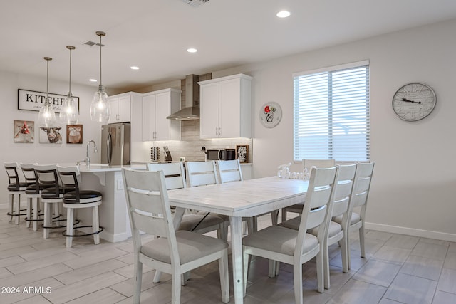 dining room featuring sink