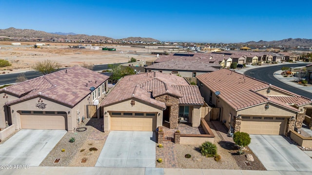 bird's eye view featuring a residential view and a mountain view