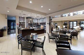 dining area featuring recessed lighting, french doors, and a tray ceiling