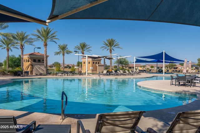 community pool featuring a patio area