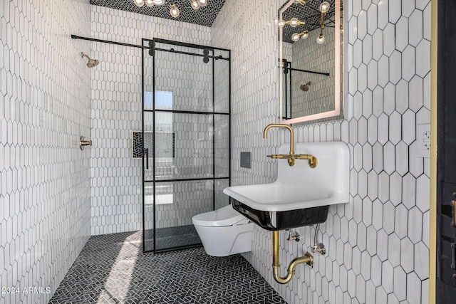 bathroom featuring tile patterned floors, sink, tile walls, toilet, and a shower with shower door