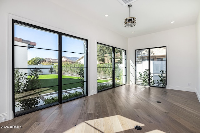 interior space with hardwood / wood-style flooring