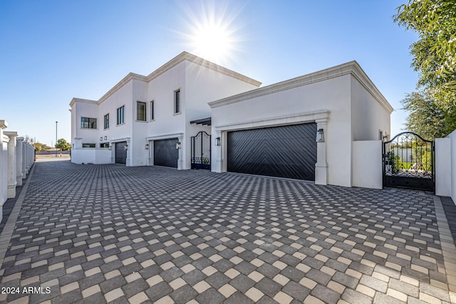 view of side of home featuring a garage