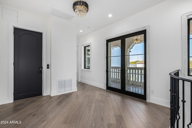 foyer entrance featuring dark wood-type flooring