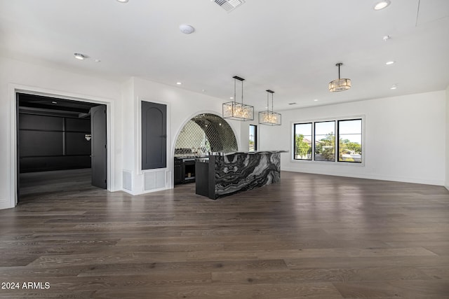 interior space with dark hardwood / wood-style flooring