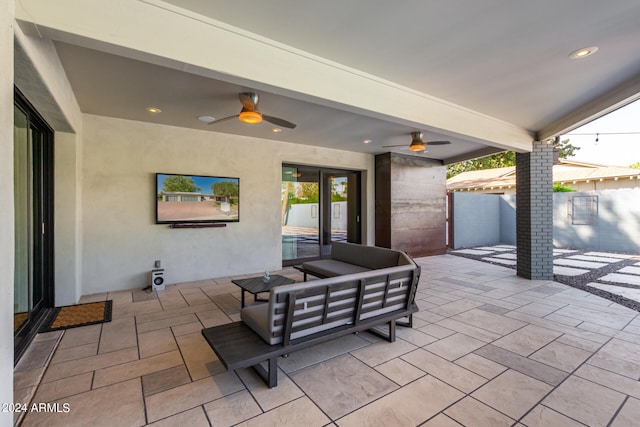 view of patio / terrace with ceiling fan and an outdoor hangout area