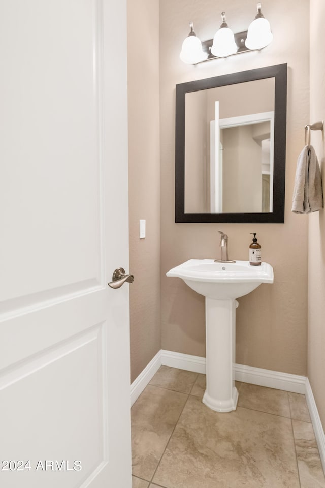 bathroom with tile patterned flooring