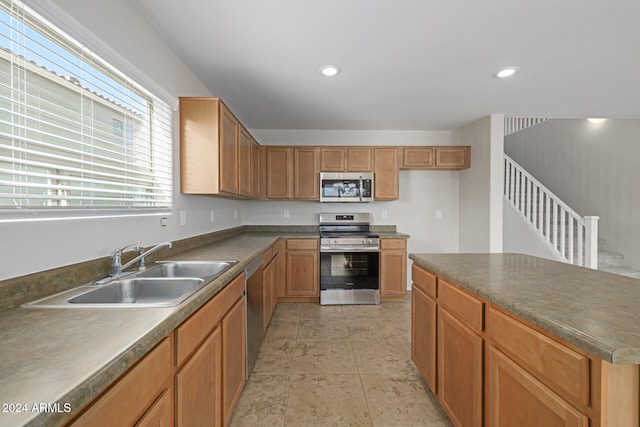 kitchen featuring appliances with stainless steel finishes and sink