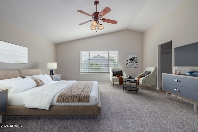 carpeted bedroom featuring ceiling fan and vaulted ceiling