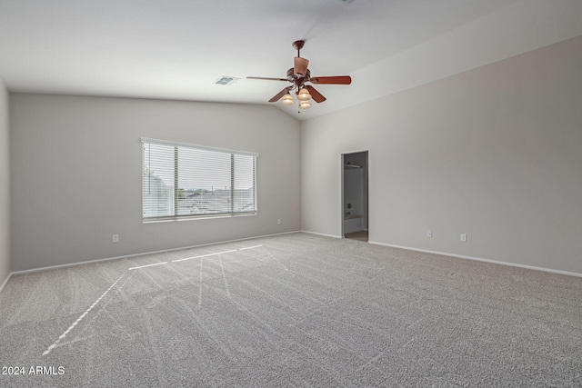 unfurnished room featuring light colored carpet, ceiling fan, and lofted ceiling