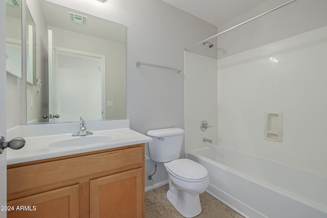 full bathroom with shower / tub combination, tile patterned flooring, vanity, and toilet