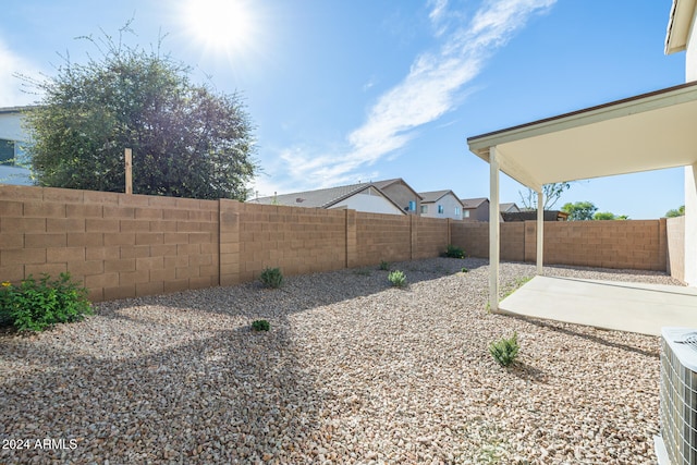view of yard with a patio area and central AC