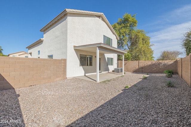 back of house featuring a patio area