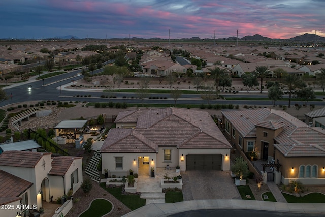 351 E Santa Lucia Ln, Queen Creek, AZ 85140 - aerial view at dusk featuring a residential view and a mountain view