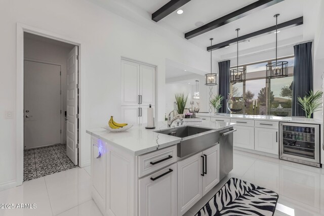 351 E Santa Lucia Ln, Queen Creek, AZ 85140 - kitchen featuring white cabinetry, a sink, beam ceiling, and wine cooler