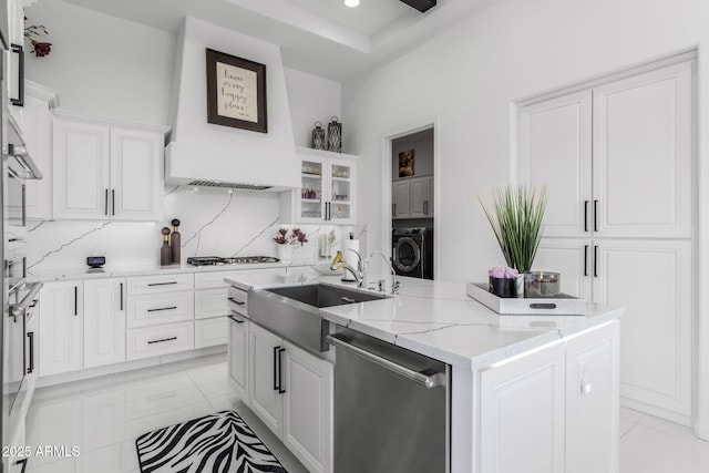 351 E Santa Lucia Ln, Queen Creek, AZ 85140 - kitchen with a sink, white cabinetry, washer / dryer, and dishwasher
