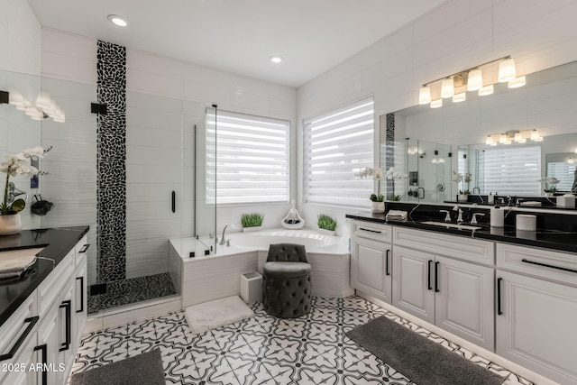 351 E Santa Lucia Ln, Queen Creek, AZ 85140 - full bathroom with a stall shower, vanity, tile patterned flooring, a bath, and tile walls