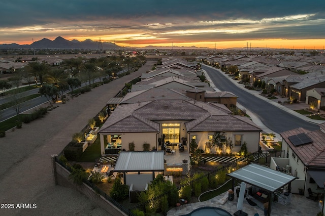 351 E Santa Lucia Ln, Queen Creek, AZ 85140 - aerial view at dusk featuring a mountain view and a residential view