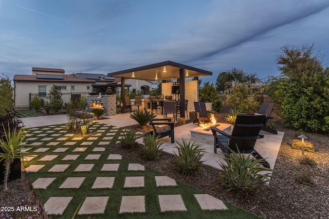 351 E Santa Lucia Ln, Queen Creek, AZ 85140 - view of patio with an outdoor fire pit and fence